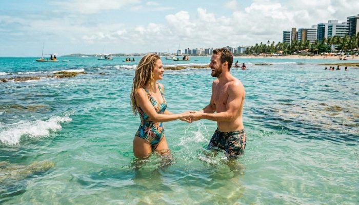 Casal_nas_aguas_praias_202606212157.jpg