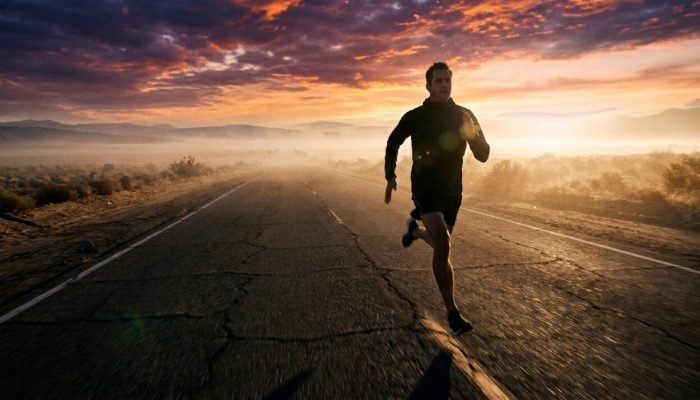 Figure_sprinting_down_empty_road_202608141525-e1786732024661.jpeg