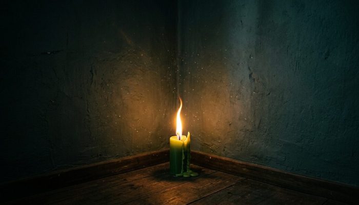 Green_candle_burning_brightly_202607101555-e1783711671287.jpeg