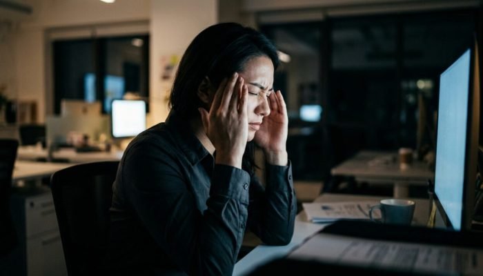 Person_experiencing_headache_at_…_202608101617-e1786389502350.jpeg