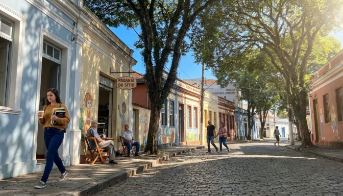 Shaded_street_with_people_walking_202605151408.jpg