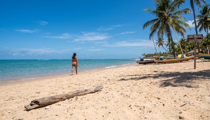 Woman_walking_on_beach_202605240620.jpg