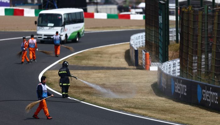 a-fire-fighter-sprays-the-gras-2.jpg a-fire-fighter-sprays-the-gras-2.jpg