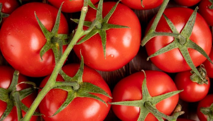 close-up-view-tomatoes-wooden-table.jpg