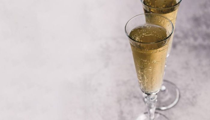 glasses-full-champagne-concrete-surface.jpg glasses-full-champagne-concrete-surface.jpg