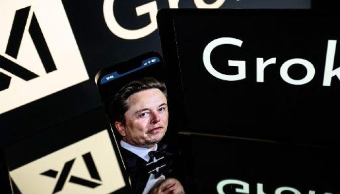 logotipo-da-inteligencia-artificial-grok-junto-com-imagem-de-elon-musk-1752254559289_v2_615x300.jpg logotipo-da-inteligencia-artificial-grok-junto-com-imagem-de-elon-musk-1752254559289_v2_615x300.jpg