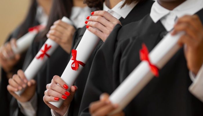 people-graduating-with-diplomas-close-up.jpg