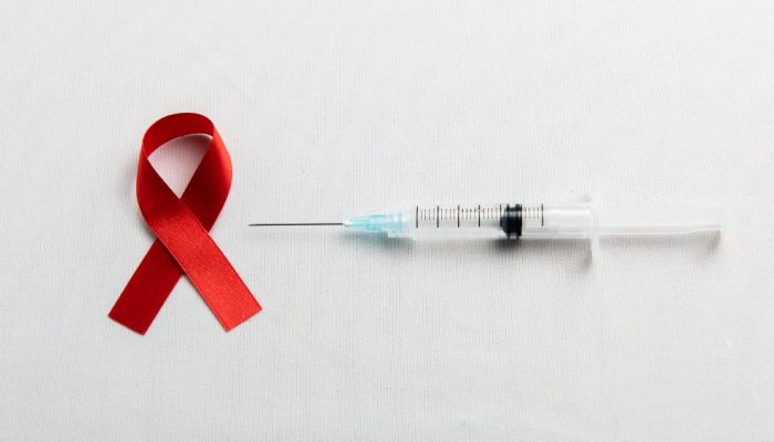 red-ribbon-syringe-with-white-background-hiv-aids-ribbon-awareness.jpg