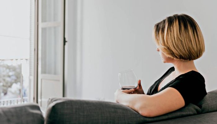 woman-with-red-wine-couch.jpg.jpg
